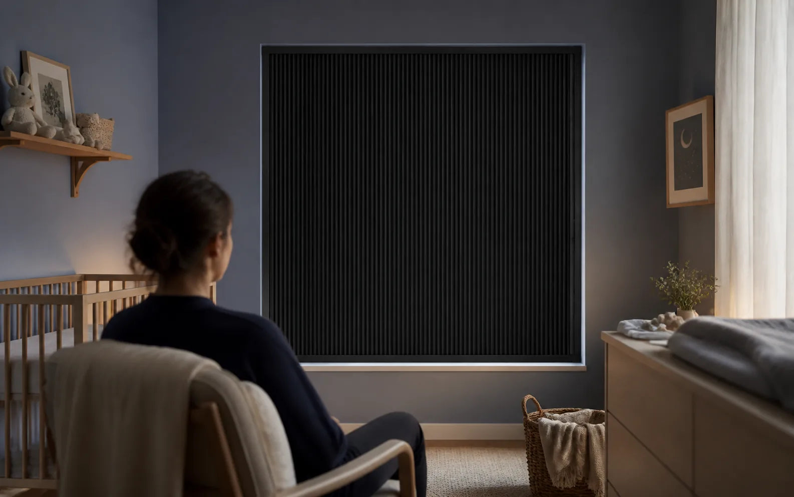 A caregiver preparing a room with Dawnproof Fixed for a daytime nap