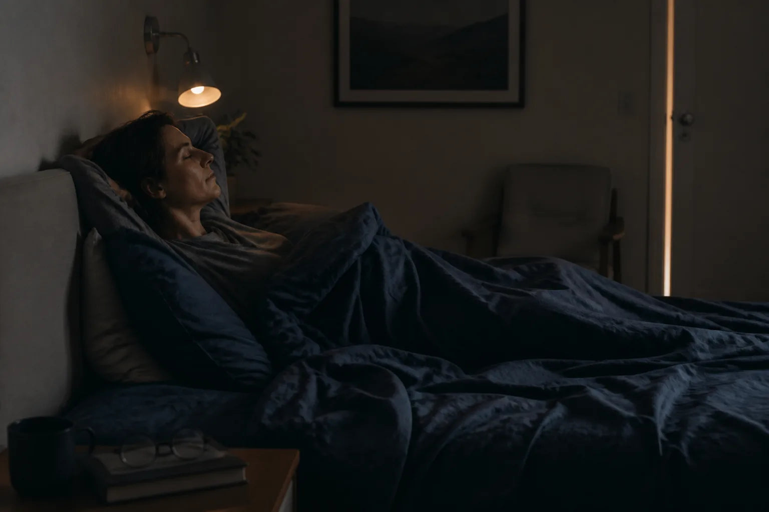 A light-sensitive sleeper resting in a dark bedroom